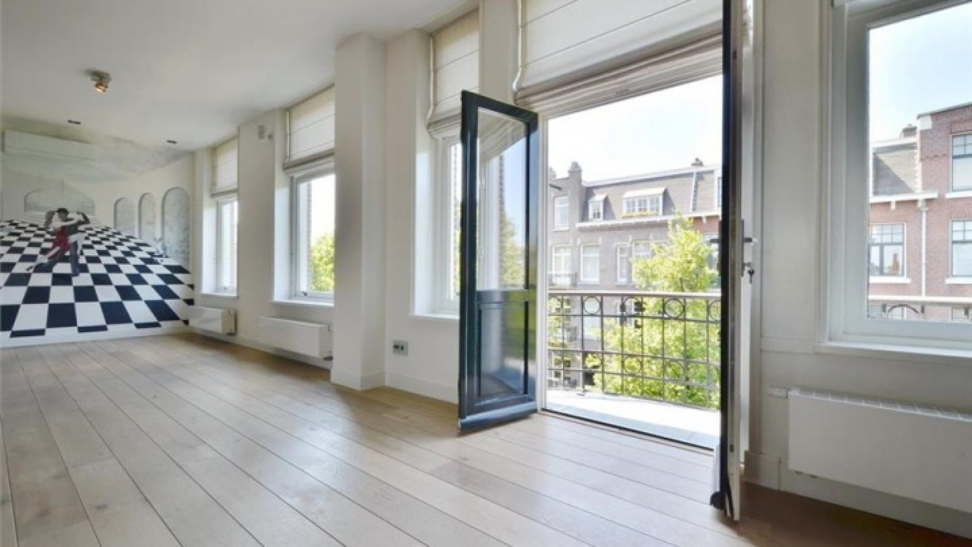Frank Rijkaard zoekt huurder voor zijn luxe dubbele bovenhuis. Zie foto's 9