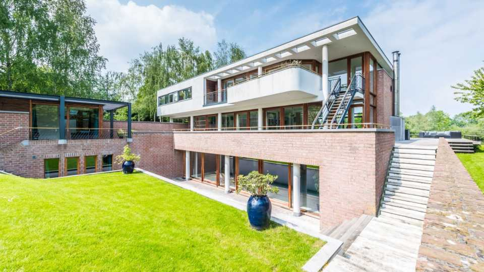 Cool Cat oprichter Roland Kahn zet zijn miljoenen villa met inpandig zwembad te koop. Zie foto's 17